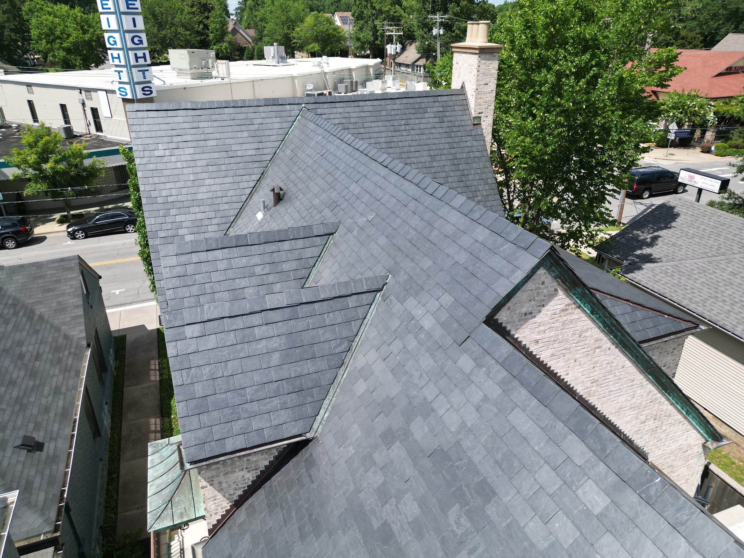 Close aerial detail of slate roof valleys and ridges